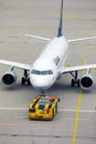 Lufthansa plane being towed