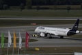 Lufthansa plane being towed