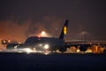 Lufthansa A380 plane doing taxi in Munich Airport, MUC, night scene