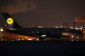 Lufthansa A380 plane doing taxi in Munich Airport, MUC, night scene