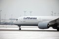 Lufthansa plane doing taxi in Munich Airport in winter Royalty Free Stock Photo