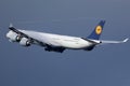 Lufthansa plane flying up in the sky, sunny sky