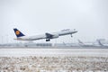 Lufthansa Airbus A321-100 D-AIRC jet landing in Munich Airport, snow