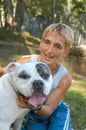 Girl with a dog at the animal shelter