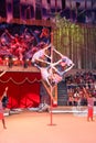 LUGANSK ,UKRAINE - APRIL 9, 2016: several acrobats in a circus performance on the pole