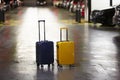 Luggage bag on the city street ready to pick by airport transfer taxi car. Royalty Free Stock Photo