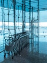 Luggage carts inside modern airport Royalty Free Stock Photo