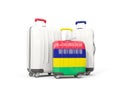 Luggage with flag of mauritius. Three bags isolated on white