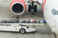 Luggage loading into a plane in an airport