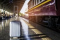 Luggage are placed on platform in the train station, while awaiting trains with abstract concepts, learning and travel to a wide Royalty Free Stock Photo