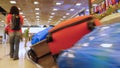 Luggage travels on a conveyor belt in the airport Royalty Free Stock Photo