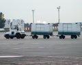 The Luggage truck in the runway of the airport, the international airport