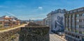 Panorama view of the Roman city walls of Lugo and downtown district with a large mural of a Roman soldier on a building