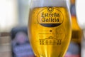 Estrella Galicia beer glass closeup shot Royalty Free Stock Photo