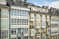 View on typical Spanish apartment buildings with windows and balconies