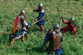 LUH, RUSSIA - AUGUST 27, 2016: Reconstruction of medieval battle of knights in armor and weapons at the festival of Royalty Free Stock Photo