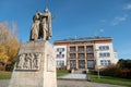 The city hall of the Luhacovice city with a memorial statue celebrating the liberation of the country in front of it