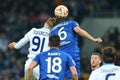 Lukasz Teodorczyk fights for the ball with Phil Jagielka in the air, UEFA Europa League Round of 16 second leg match between