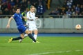 Lukasz Teodorczyk shoots the ball while Antolin Alcaraz tries to block it, UEFA Europa League Round of 16 second leg match between Royalty Free Stock Photo