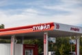 Lukoil gas station and a fuel price display. Higher prices for gasoline and petroleum products. The price of a barrel of oil