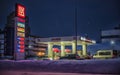 Lukoil gas station at night in winter