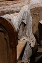 Lukova, Czech Republic, 29 October 2023: Abandoned catholic church of St. George or Jiri, Ghosts line pews, statues by Jakub