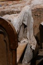 Lukova, Czech Republic, 29 October 2023: Abandoned catholic church of St. George or Jiri, Ghosts line pews, statues by Jakub