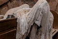 Lukova, Czech Republic, 29 October 2023: Abandoned catholic church of St. George or Jiri, Ghosts line pews, statues by Jakub