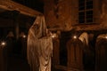 Lukova, Czech Republic, 29 October 2023: Abandoned catholic church of St. George or Jiri, Ghosts line pews, statues by Jakub