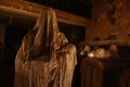 Lukova, Czech Republic, 29 October 2023: Abandoned catholic church of St. George or Jiri, Ghosts line pews, statues by Jakub