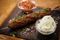 Lula kebab with tomato salsa Royalty Free Stock Photo