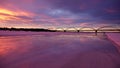 Lulea bridge at sunset from the iceroad on a winter day in Sweden Royalty Free Stock Photo