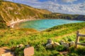 Lulworth Cove top tourist attraction English Jurassic Coast Royalty Free Stock Photo