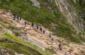 Walkers stepping to beach at Durdle Door Royalty Free Stock Photo