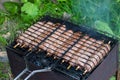 Lulya kebab from meat are prepared in the grill. Shish kebab in the grill.