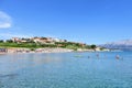 Locals and tourists enjoying a beautiful summer day along the sandy beaches of Lumbarda Beach on Korcula Island, Croatia Royalty Free Stock Photo