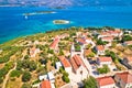 Lumbarda. Korcula island vllage of Lumbarda church and coastline aerial view