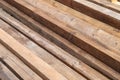 lumber, solid wooden construction beam close-up for construction
