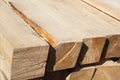 Lumber stacked in a row at the sawmill, lumber stack for storage construction Royalty Free Stock Photo