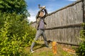 Lumberjack chopping wood. Young man chopping woods with an axe Royalty Free Stock Photo