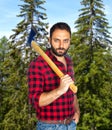 Lumberjack among the trees. Royalty Free Stock Photo