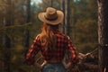 Lumberjack woman with hat in forest. Generate Ai