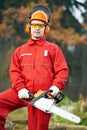 Lumberjack Worker With Chainsaw In The Forest Royalty Free Stock Photo