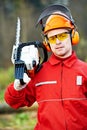 Lumberjack Worker With Chainsaw In The Forest Royalty Free Stock Photo