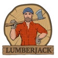 Lumberjeck on cut down tree wooden background