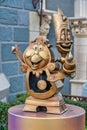 Lumiere and Cogsworth Gold Statue 50th Anniversary Disney Royalty Free Stock Photo