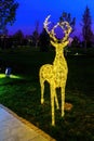 A luminous christmas deer from garlands.