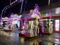 Luminous figures of deer in front of the shopping center