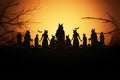 Luminous Halloween Backdrop with Eerie Silhouettes, Witches, Pumpkins, and Vivid Moonlight Royalty Free Stock Photo