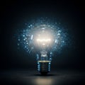 A luminous light bulb is centered against a dark backdrop, emitting a bright glow. Royalty Free Stock Photo